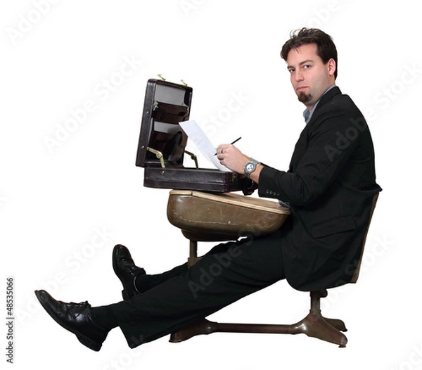 Fototapeta Businessman Learns as a Student