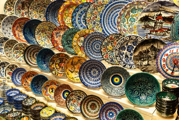 Fototapeta Handmade ceramics, pottery, bowl in the Grand Bazaar, Istanbul, Turkey. Handmade gift ceramic bowls, pottery, and plates.