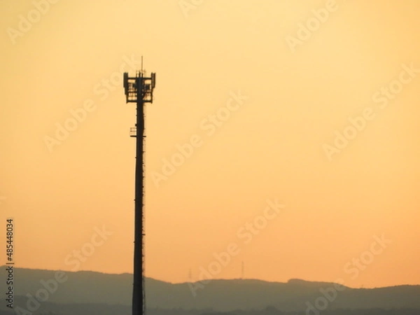 Obraz 朝焼けに映えるアンテナ