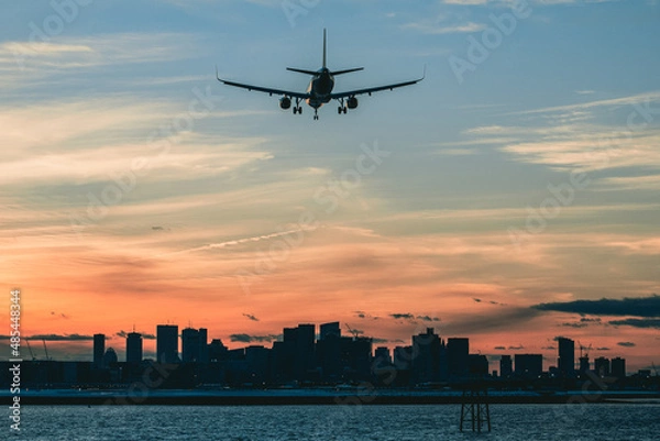 Fototapeta Plane landing in Boston