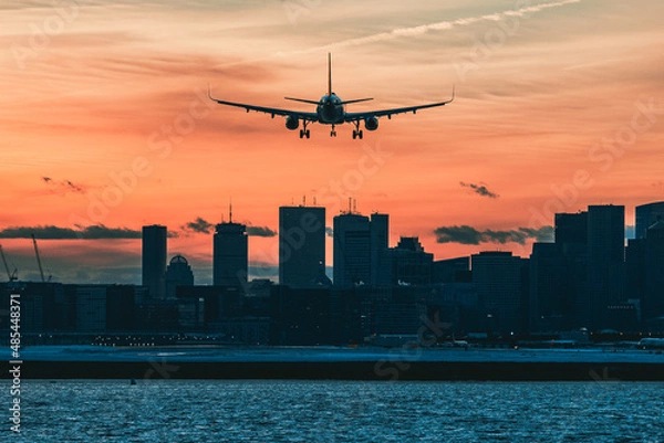 Fototapeta Plane landing in Boston