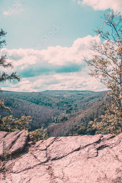 Obraz cliff mountains sky clouds Harz Germany