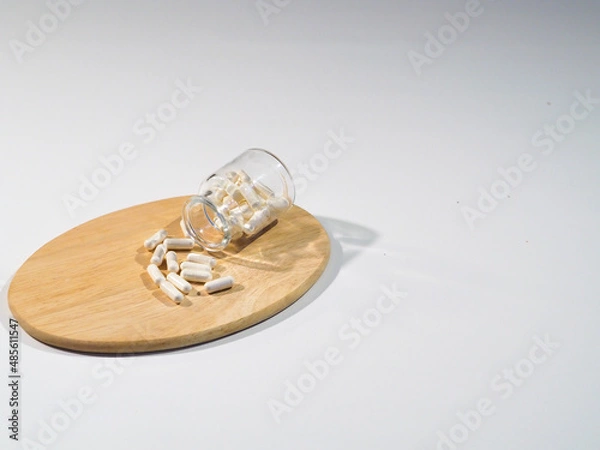 Obraz Pharmacy bottle with white pills