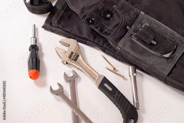 Fototapeta A set of wrenches for repair and installation on a white background. Service banner for technician, plumber or repairman