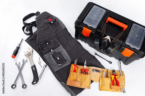 Fototapeta Set of construction tools for repair and installation on a white background. Service banner for plumber or repairman