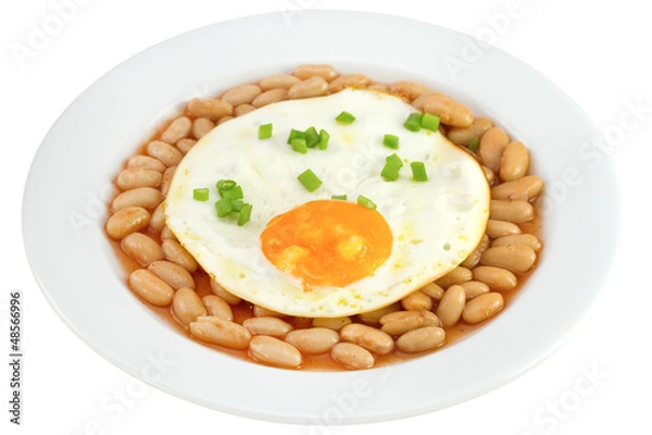 Fototapeta fried egg witn green onion and white beans in sauce