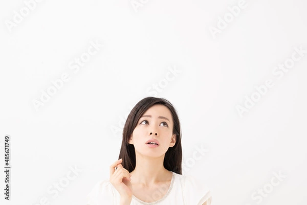 Fototapeta 悩む女性