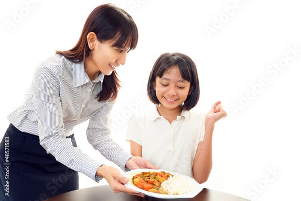 Fototapeta 料理に喜ぶ女の子