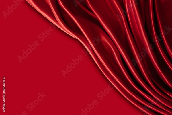 Fototapeta Beautiful elegant wavy hot red satin silk luxury cloth fabric texture with monochrome background design. Wallpaper, banner or card with copy space.