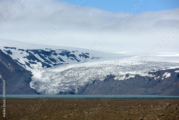 Fototapeta Tongue of the Langjökull glacier calves into the Hvitarvatn glacier 