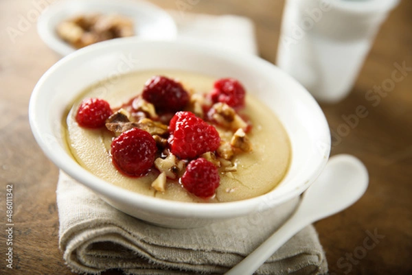 Obraz Homemade semolina pudding with raspberry and nuts