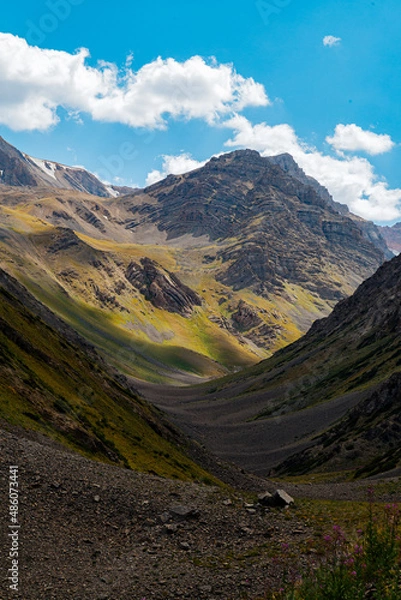 Fototapeta mountain gorge under sky with clouds