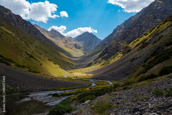Fototapeta mountain gorge under sky with clouds