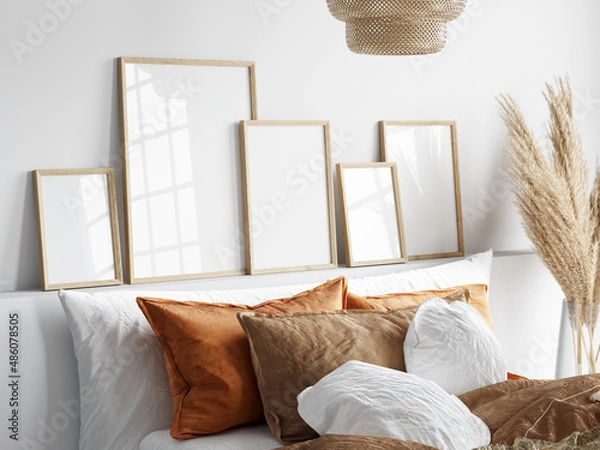 Fototapeta gallery frame mockup in boho bedroom interior with bed and pampas grass, 3d render