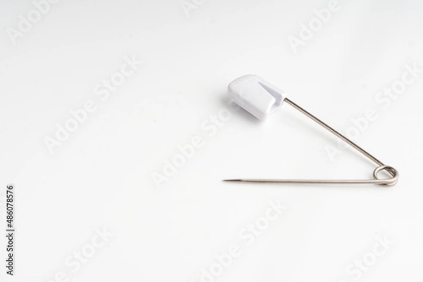 Obraz white clothespin over white background