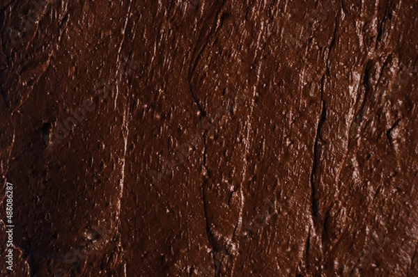 Obraz Chocolate milk smeared brown background horizontal blurred around edges