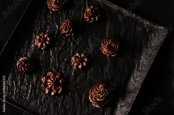 Obraz Chocolate cream squeezed through a piping bag