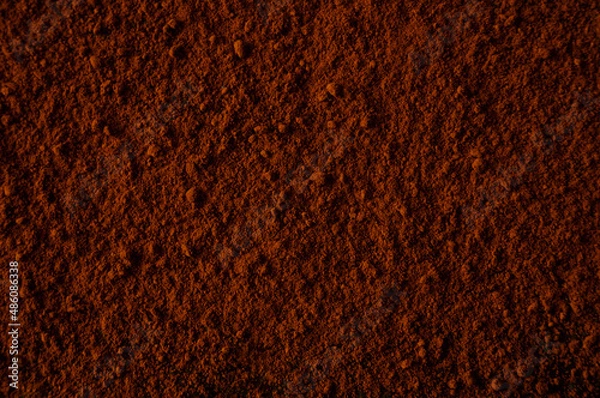 Obraz Cocoa powder scattered on the surface background
