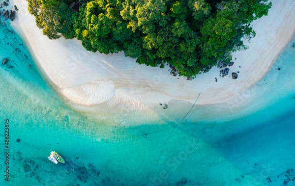 Fototapeta Top view of white sand beach tropical  with seashore as the island in a coral reef ,blue and turquoise sea Amazing nature landscape with blue lagoon