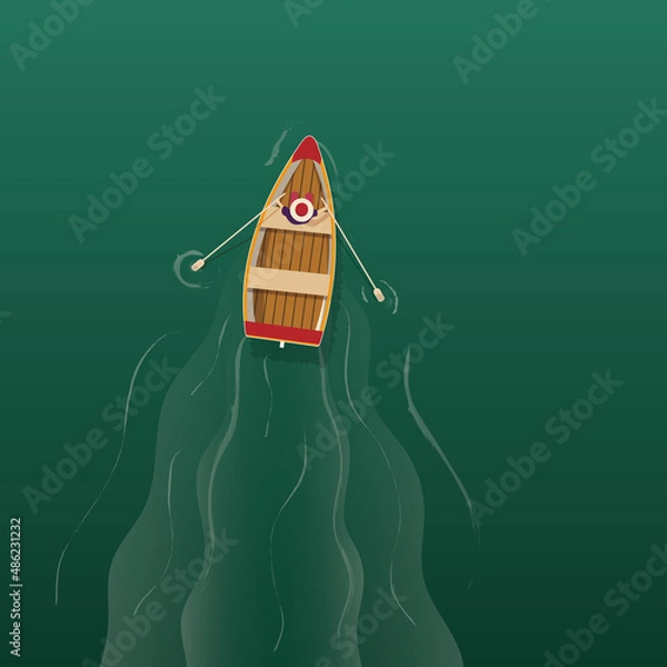 Fototapeta A man rows with oars while sitting in a boat. View from above. A wooden boat cuts through the water.