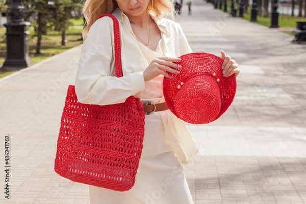 Obraz Beautiful hat and handmade bag in female hands