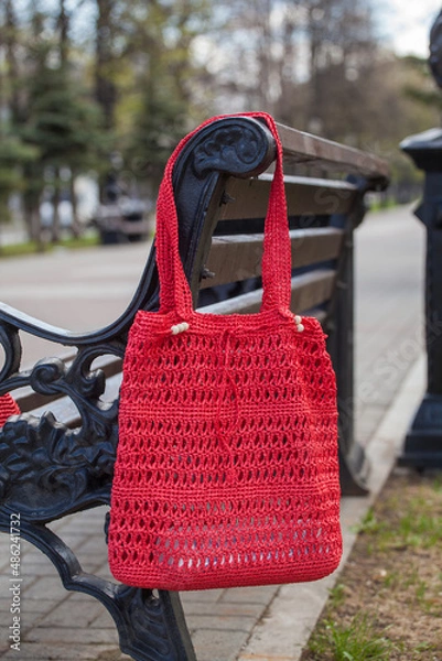 Obraz Beautiful handmade bag hanging on the bench