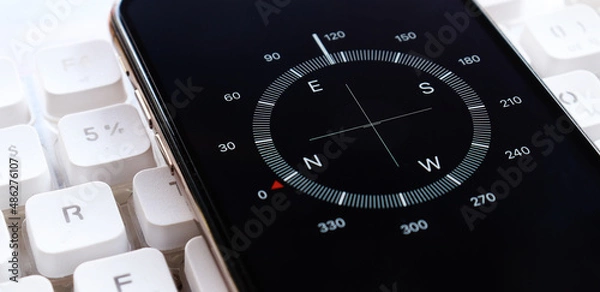 Fototapeta Compass app on smartphone screen