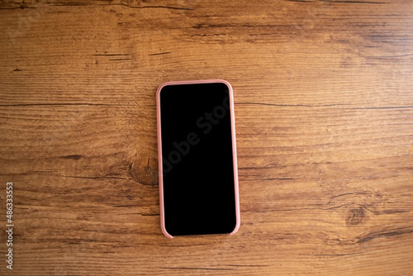 Fototapeta Smarthphone on the table