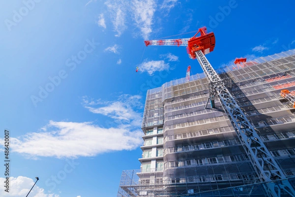 Fototapeta 工事現場　クレーン　ビル建設　青空