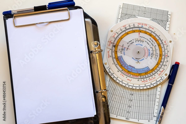 Obraz Navigation computer and pilot's kneeboard as a concept for flight training.