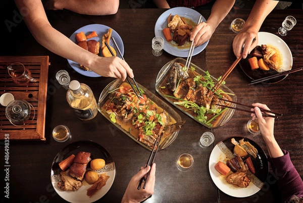 Fototapeta Chinese food with chopsticks, view above