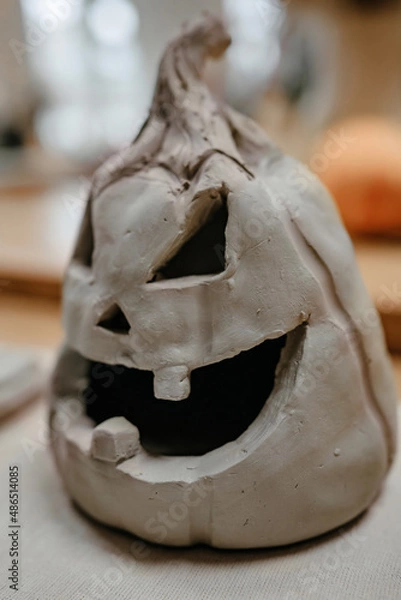 Obraz Pumpkin head sculpted from clay close-up