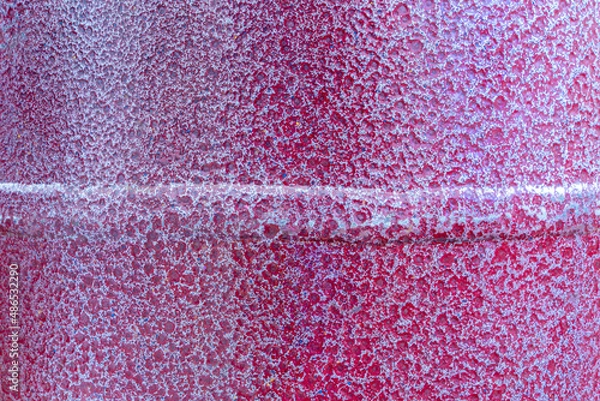 Fototapeta Cast iron texture with red color