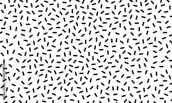 Obraz Black capsule shaped scattered pattern on white background vector