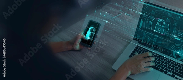 Fototapeta Cyber security and data protection information privacy internet technology concept.Businessman working on smartphone modern computer show padlock protecting business and financial data 