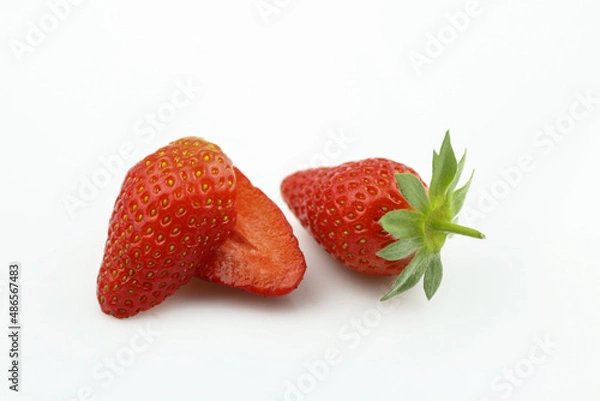 Fototapeta Strawberry isolated. Strawberries isolate. Whole, half, cut strawberry on white. Strawberries isolate. Side view organic strawberries. Full depth of field.