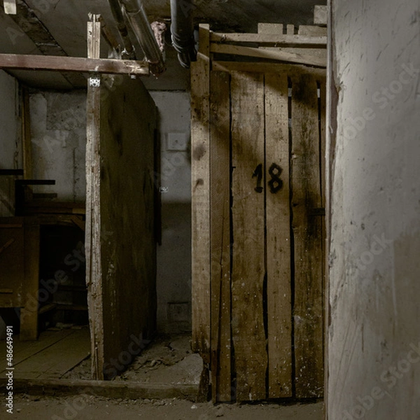 Obraz abandoned basement with electricity and sewer pipes