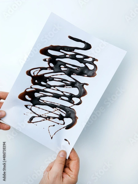 Obraz Hand holding a paper