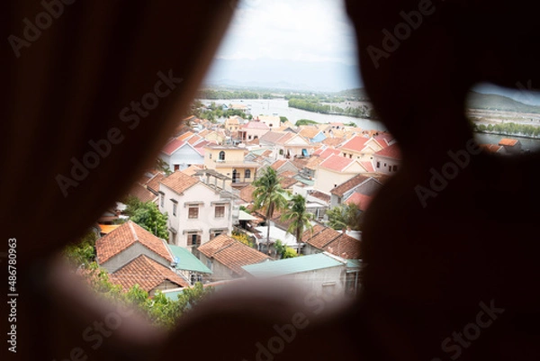 Fototapeta Aerial view fishing village. Vietnam. sea and rooftoops