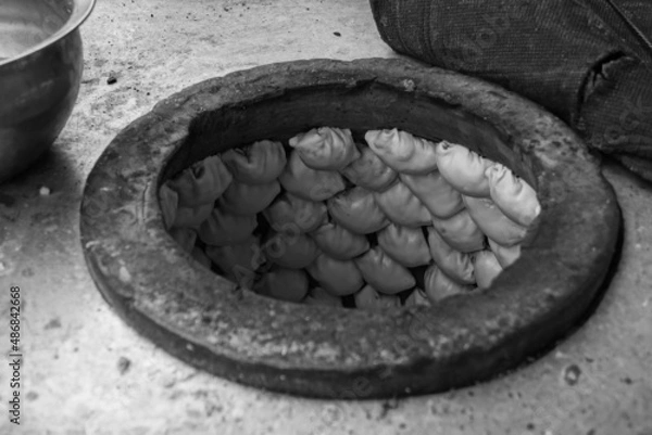 Obraz ウイグルのスナック サモサを焼く