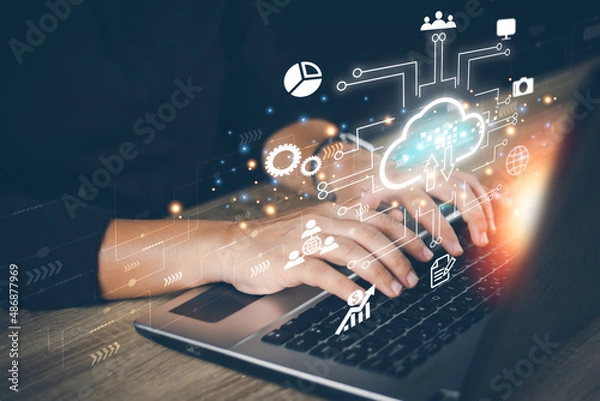 Fototapeta Businesswomen is using a laptop to access the cloud computing system, cloud computing, big data, internet of things, business processes, various storage systems