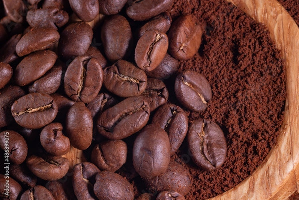 Obraz Coffee beans on ground coffee background