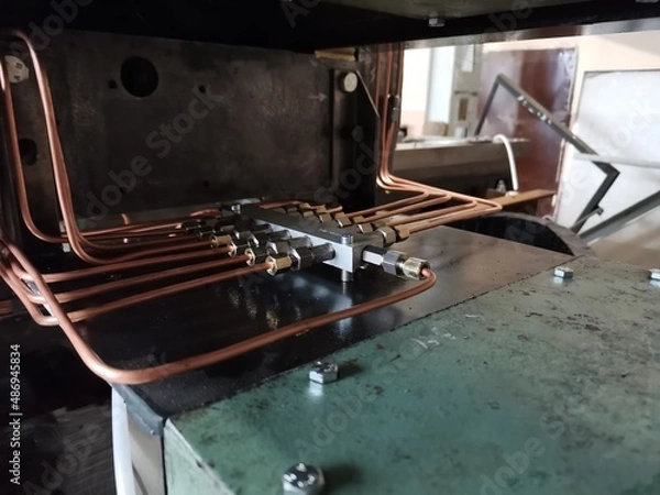 Obraz Lubrication system for a metalworking lathe.