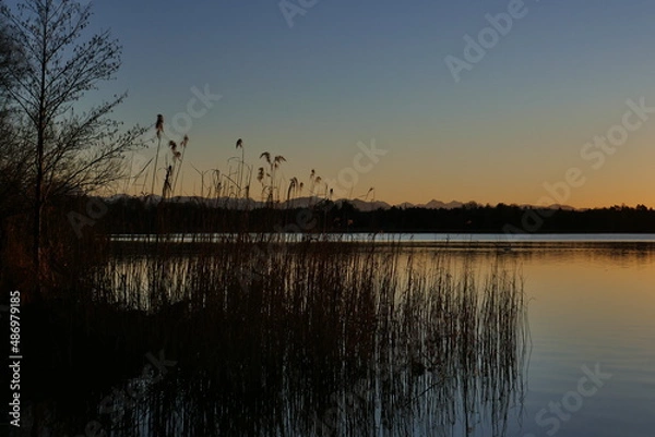 Fototapeta Beautiful Sunset on Lake Starnberg in Bavaria 2022 with the Alps in the Background