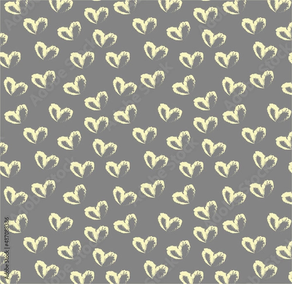 Fototapeta Seamless pattern of hand drawn hearts in pastel yellow color on gray background