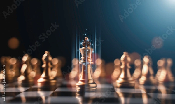 Obraz Golden king chess stand in front of others chess pieces. Leadership business teamwork and marketing strategy planing concept.