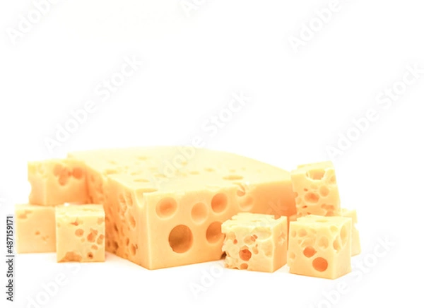 Obraz Slices of cheese with holes on a white background