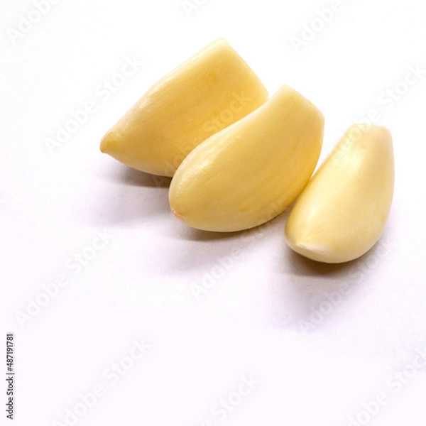 Obraz Fresh whole peeled garlic gloves isolated