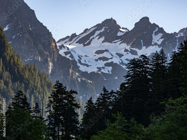 Obraz Sunrise on snowcapped peaks, view from within Enchanted Valley in Olympic National Park in Washington.