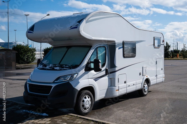 Obraz White house on wheels in the parking lot.